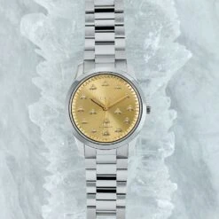 G-Timeless Watch, Stainless Steel Case & Golden Sunbrushed Dial With Bees 9 G-Timeless Watch, Stainless Steel Case & Golden Sunbrushed Dial With Bees -Home Decor Shop for web 0010 holiday 2022 lifestyle gucciwatch
